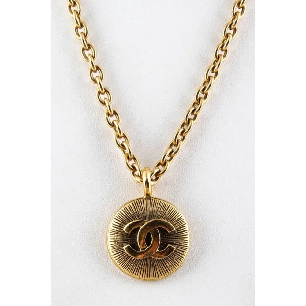 Chanel Vintage Gold Tone Embossed CC Logo Pendant Long Chain Necklace